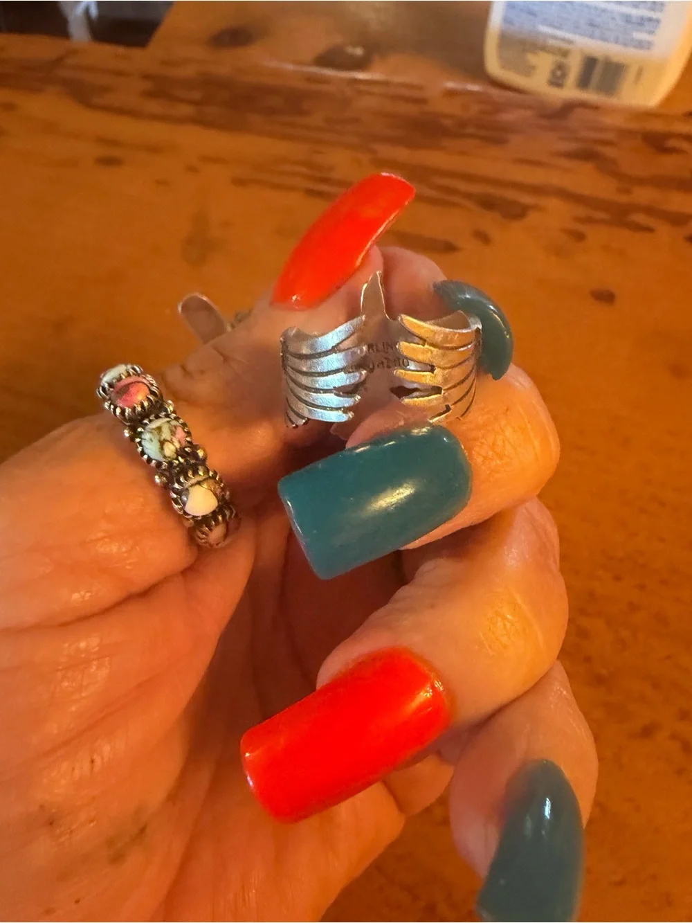 Native made Silver Eagle Ring with Orange spiny Stone adjustable